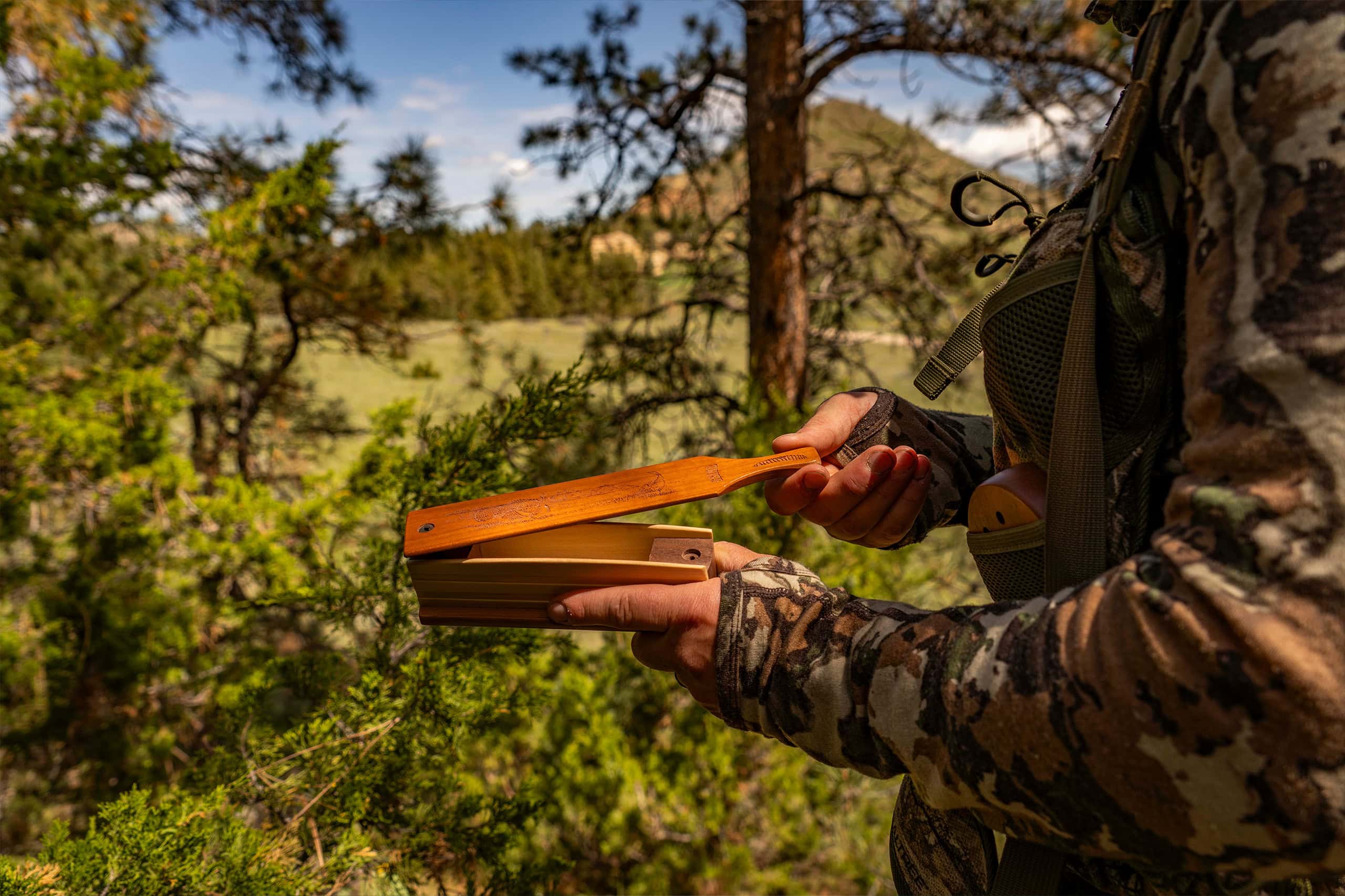 Hunter uses one of his three essential turkey calls